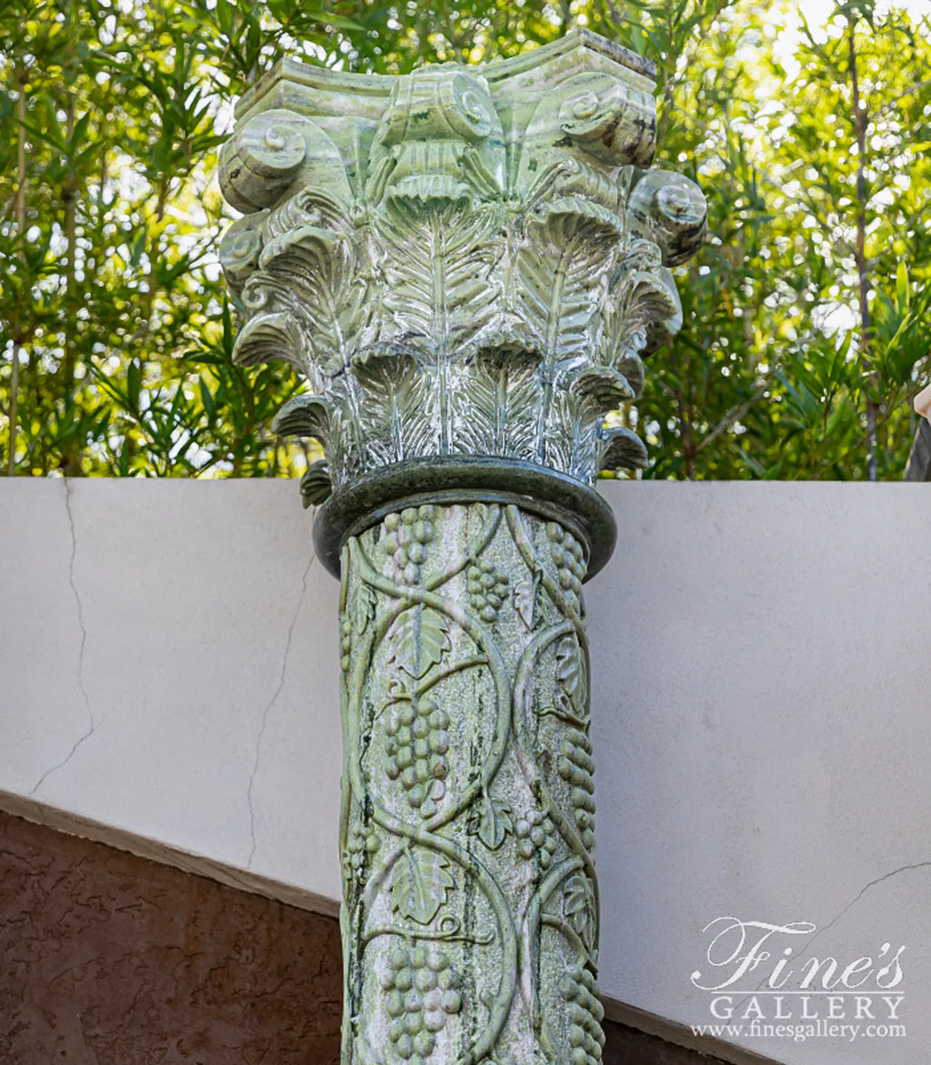 Vintage Verde Green Marble Column Pair with Hand-Carved Grape Vine Detail and Fleur Cap