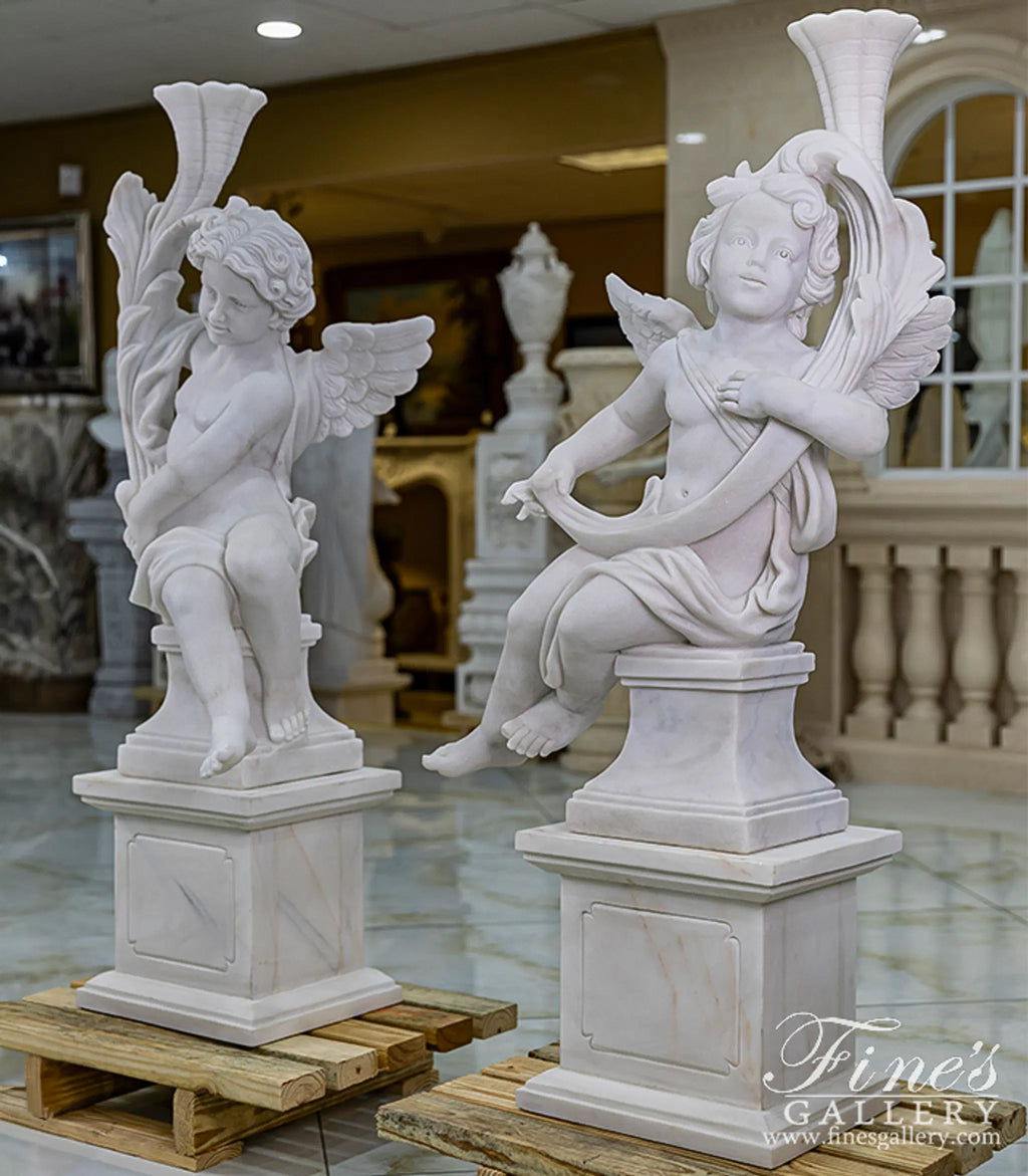 Carved Marble Cherub Statues
