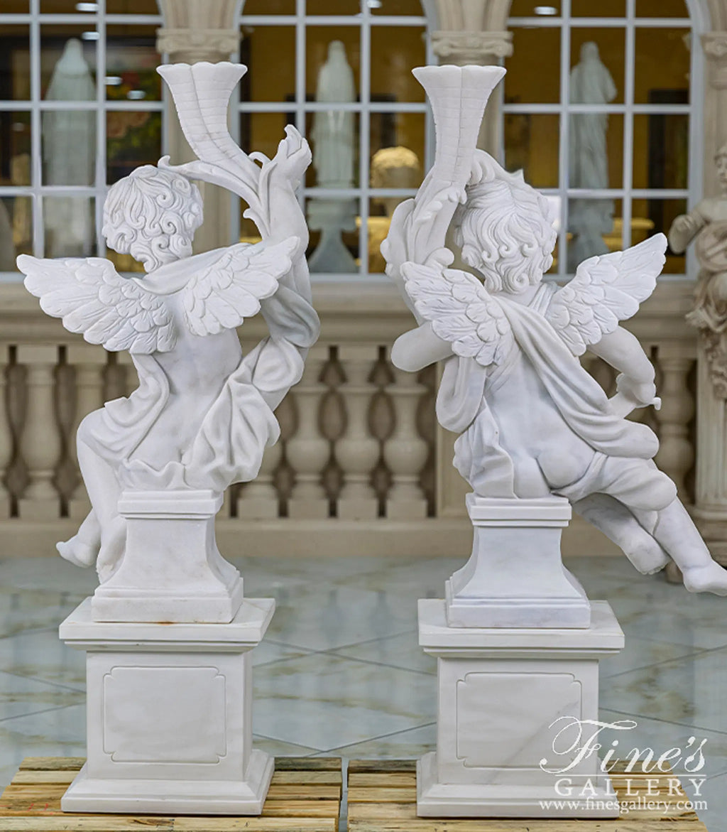 Carved Marble Cherub Statues