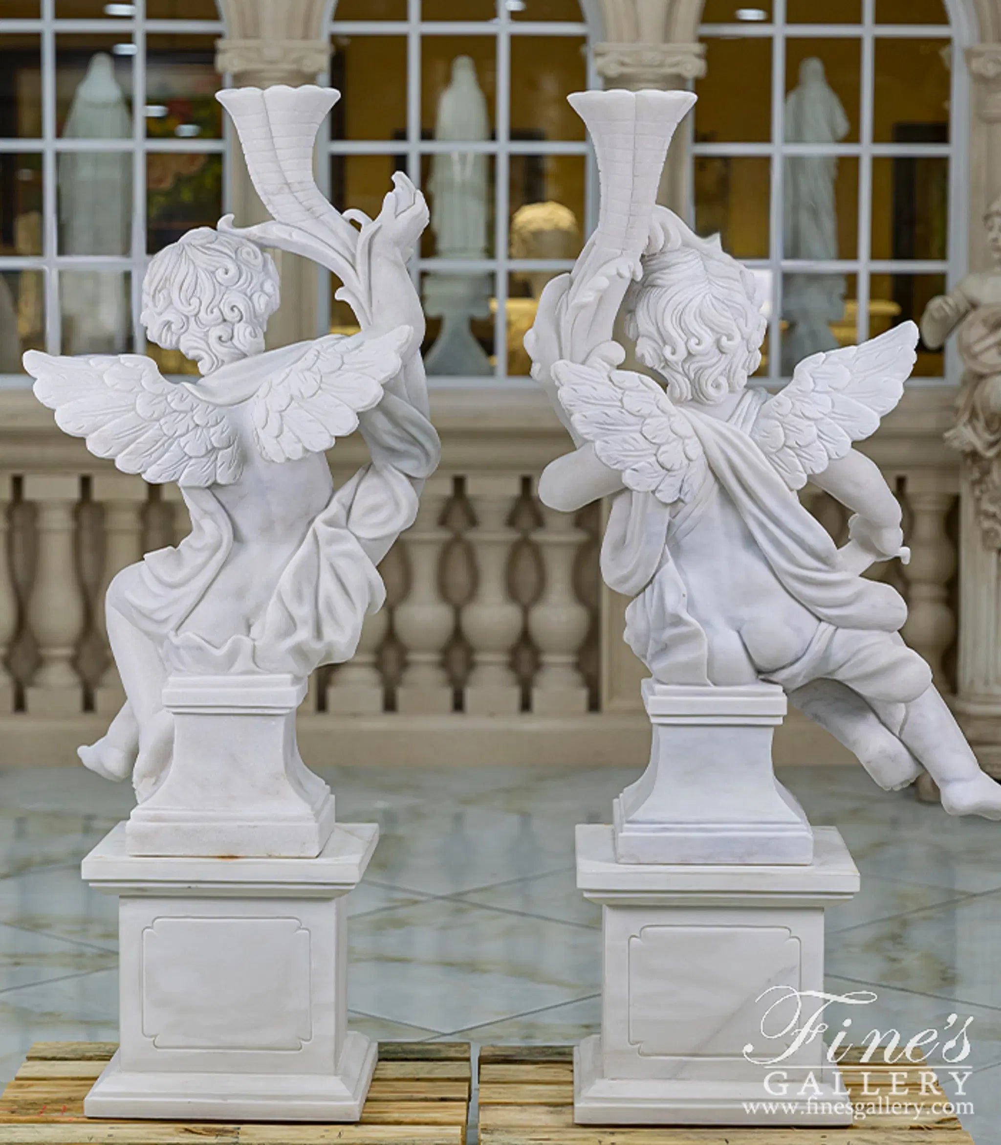 Carved Marble Cherub Statues