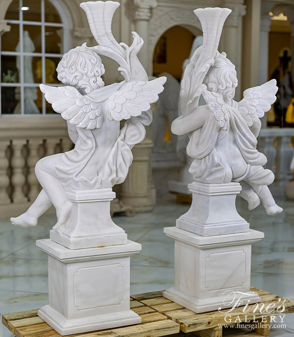 Carved Marble Cherub Statues