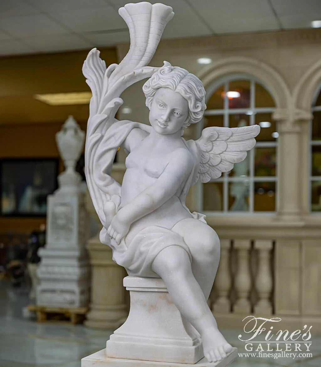 Carved Marble Cherub Statues